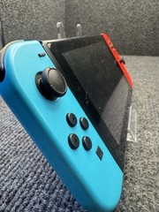 Nintendo Switch Console 32GB 1080p HDMI w/Red/Blue Joy-Con Controllers READ