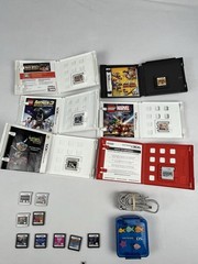Nintendo 3DS XL Red Bundle w/ Charger, Stylus, SD Card, and 15 DS/3DS Games