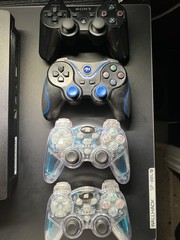 PS3 Slim Console + 4 Controllers