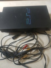 Playstation 2 Fat Console With Accessories and 20 Games.