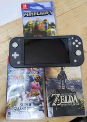Nintendo Switch Lite Gray With Three Games Zelda Smash Bros Minecraft WORKING