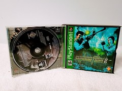 Playstation 1 with 1 controller, AV Cable, power cable and Syphon Filter 2 game