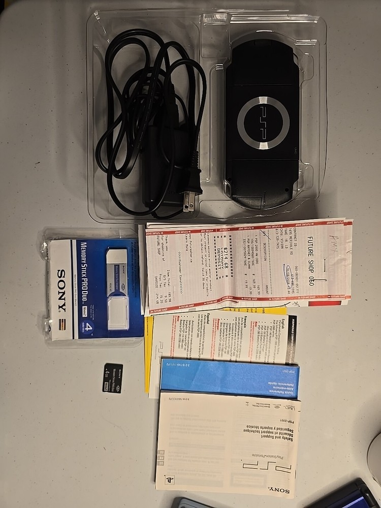 Sony PSP 2000 Launch Edition 64MB Handheld System – Piano Black CIB Open