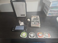 Sony PSP Go PSP-1001 PlayStation Portable – Black Bundle With Games