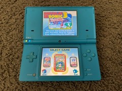 Nintendo DSi Handheld System Blue + Sonic Classic Collection bundle lot console