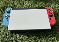 Nintendo Switch OLED Bundle – Zelda Case, SD Card, Grip, Controller Grip