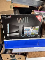 Wii with motion plus controller with nunchuck and charging station