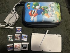 “New” Nintendo 3DS Super Mario White Edition + Games