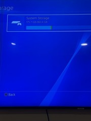 Sony PlayStation 4 Slim CUH-2215B 1TB Bundle 2 controllers, 4 games, and more