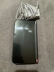 Nintendo 3DS XL Metallic Black with charger and 5 games great condition