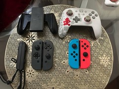 Nintendo Switch Bundle – Includes Several Controllers, Disk, and Case Lot