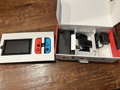 Nintendo Switch with Neon Blue and Red Joy-con