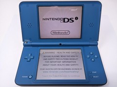 Nintendo DSi XL Handheld System – Midnight Blue w/ One Game