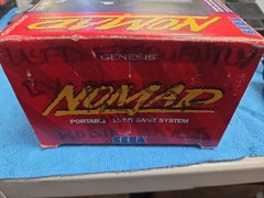 Sega Nomad Console. With Box (no inserts). A/C adaptor. Battery holder missing..