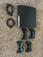 Playstation 3 Console + 4 Controllers + 13 Games + HDMI Cable.