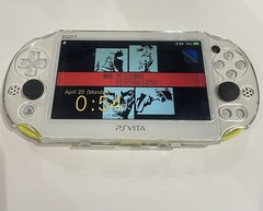 Sony PS Vita PCH-2000 1GB Lime Green/White Handheld Console