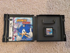 Nintendo DSI console black w/charger, carrying case & games (Mario, Sonic, etc)