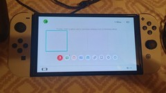 Nintendo Switch White OLED Handheld Console with Joycons, Cords, and Dock
