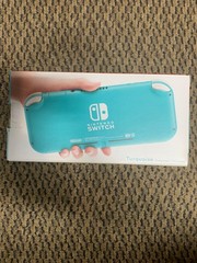 Nintendo SWITCH LITE Turquoise Color New Box has some damage