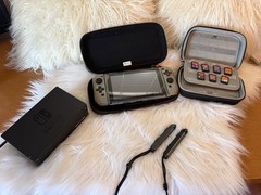 Nitendo Switch 1 V2 (works well!) with case, games, TV dock, and wristlets