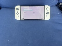 Nintendo Switch OLED Model 64GB black Console with matted White Joy Cons