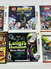 Nintendo 3DS XL Red Bundle w/ Charger, Stylus, SD Card, and 15 DS/3DS Games