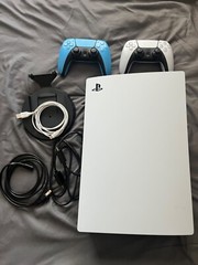 Ps5 console w/ 2 controllers & 6 ft charger. Blu-Ray Disc Player.