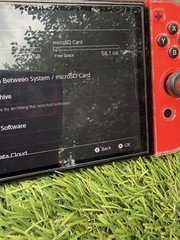 Nintendo Switch OLED Bundle – Zelda Case, SD Card, Grip, Controller Grip