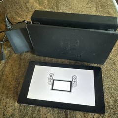 Nintendo Switch Tablet, dock, and charging/power cable – no joy cons