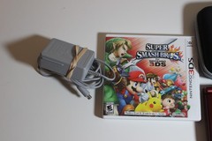 Nintendo New 3DS XL Console Handheld Bundle w Pokemon Y Moon Smash Brosh VGUC