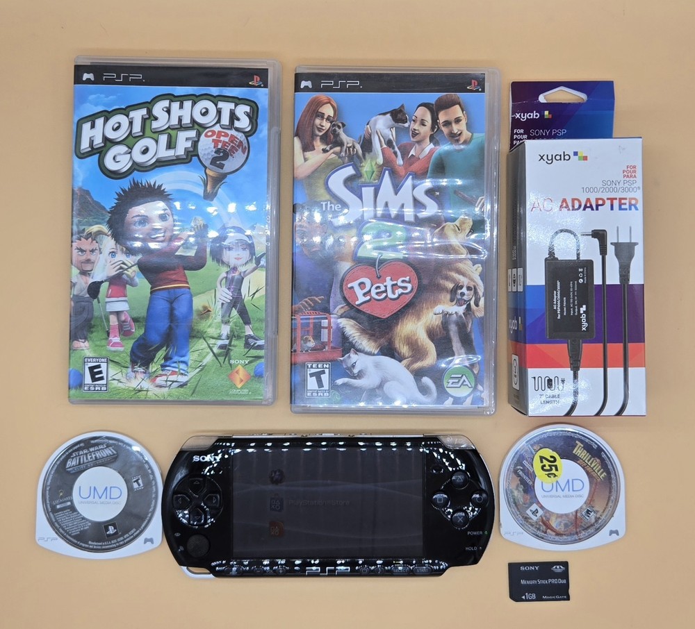 Sony PSP-2000 w/4 Games Sims Pets Hot Shot Golf Star Wars Sim Card w/Charger