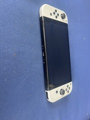 Nintendo Switch OLED Model 64GB black Console with matted White Joy Cons