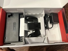 Nintendo Switch with Neon Blue and Red Joy-con