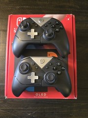 Nintendo Switch OLED Bundle W/2 Controllers, 3 Digital Mario games- USED In Box