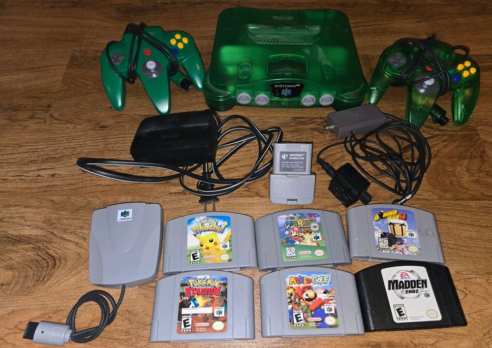 Nintendo 64 Jungle Green, 2 controllers & 6 games. Mario Golf and Super Mario 64