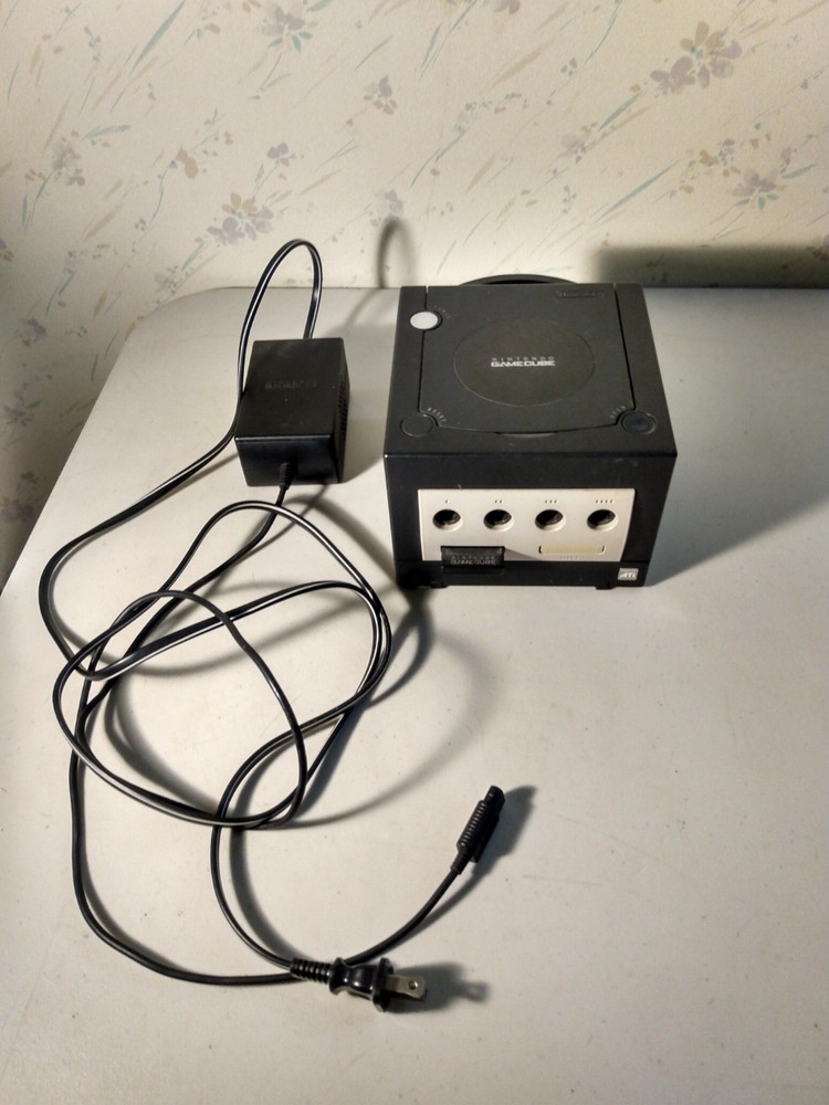 GameCube console and power cord only AS IS READ DESCRIPTION