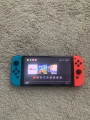 Nintendo Switch OLED Model HEG-001 Handheld Console – 64GB – Black/Neon Red/Neon