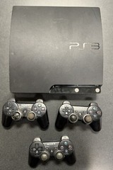 PlayStation 3 Console With 3 Controllers And Cables