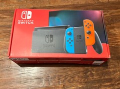 Nintendo Switch with Neon Blue and Red Joy-con