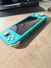 Nintendo Switch Lite – Turquoise (REGION FREE) COMES WITH CHARGER