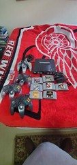 N64 Console, 4 Controllers, 7 games Tested Working Goldeneye memory cards OEM