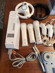 Wii Console with wii Sports, Games, Controllers and accessories – WOW!