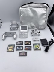 NICE 2002 Nintendo Gameboy Advance SP Silver AGS-001 w/7 Games and Accessories!