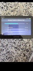 Sony PS Vita PCH-1000 Black 16GB Wi-Fi Bluetooth NTSC-U/C w/2 Games