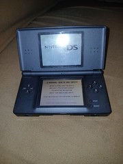 Nintendo DS Lite Black Touchscreen Handheld System with games, case and charger
