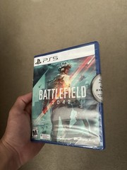 white ps5 console comes with a free game and 2 gaming controllers