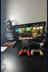 Horror theme ps4 Gaming Set Up monitor screen, and 3 controllers are included