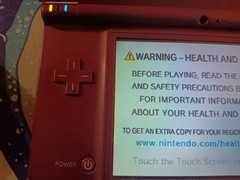 Nintendo DSi XL Handheld System – Burgundy