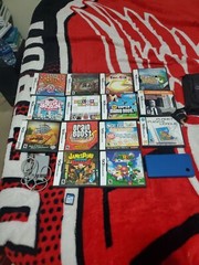 Nintendo DSi Blue Handheld Console System 14 games Charger and case 2 gb card