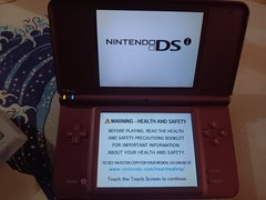 Nintendo DSi XL Handheld System – Burgundy